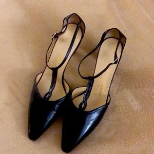 Black leather pumps